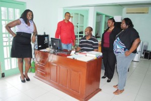 Mr Gaston Barry (centre), with PEP officials, from left, Ms Kerlyn Jones (PEP Coordinator in Nevis), Mr Geoffrey Hanley (PEP Project Manger), Mrs Celia Christopher (PEP’s Training Coordinator), and Ms Telly Valerie Onu (PEP’s Consultant).