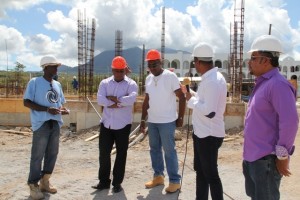 : Deputy Premier of Nevis and Minister of Tourism Hon. Mark Brantley (second from right) with the management team of the Residence at Tamarind Cove and Marina Project (L-R) Project Foreman Linel Amory, Project Manager Vaughn Walters and Assistant Project Manager Laughton Browne and Managing Director and local investor Greg Hardtman (extreme right)