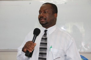 Permanent Secretary in the Ministry of Social Development Keith Glasgow at the launch of the Introduction to Computer Classes for Seniors at the Nevis International School’s computer lab on January 29, 2015 