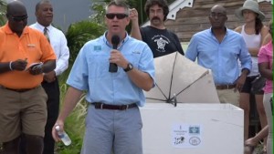 Executive Director of the Sea Turtle Conservancy David Godfrey at the release of sea turtle Millie on the beach outside the Four Seasons Resort on Nevis on July 13, 2015. Director of Recreation at the Four Seasons Resort Mackie France who chaired the event stands on his extreme left while Permanent Secretary in the Ministry of Agriculture and Fisheries Eric Evelyn who spoke on behalf of Hon. Alexis Jeffers stands second from left 